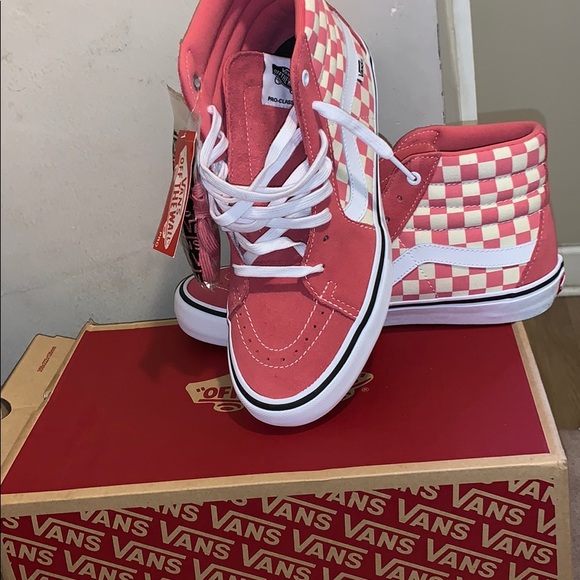 red checkerboard high top vans